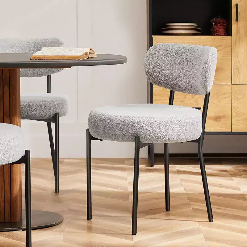 Chaise de salle à manger ronde capitonnée en fausse fourrure avec cadre en acier
