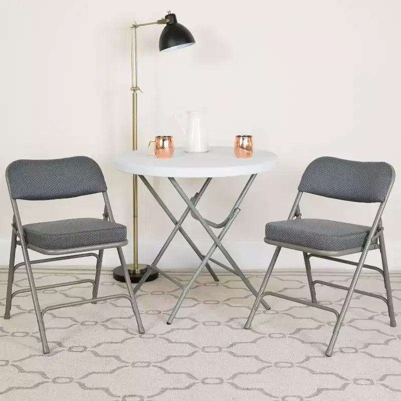 Chaises pliantes en métal HERCULES avec sièges rembourrés