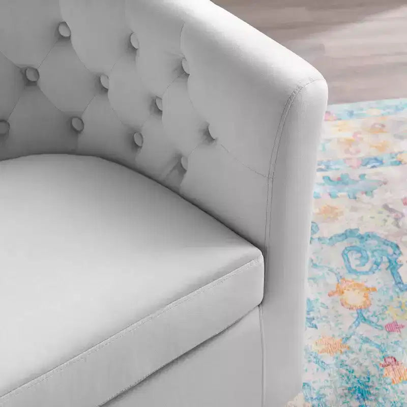 Fauteuil pivotant en velours capitonné Prospect